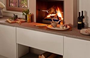 Brunner Urfeuer 50/66 кухонный камин с грилем.